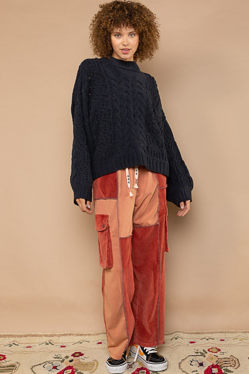 Oriana | POL sweater with stand-up collar and cable pattern