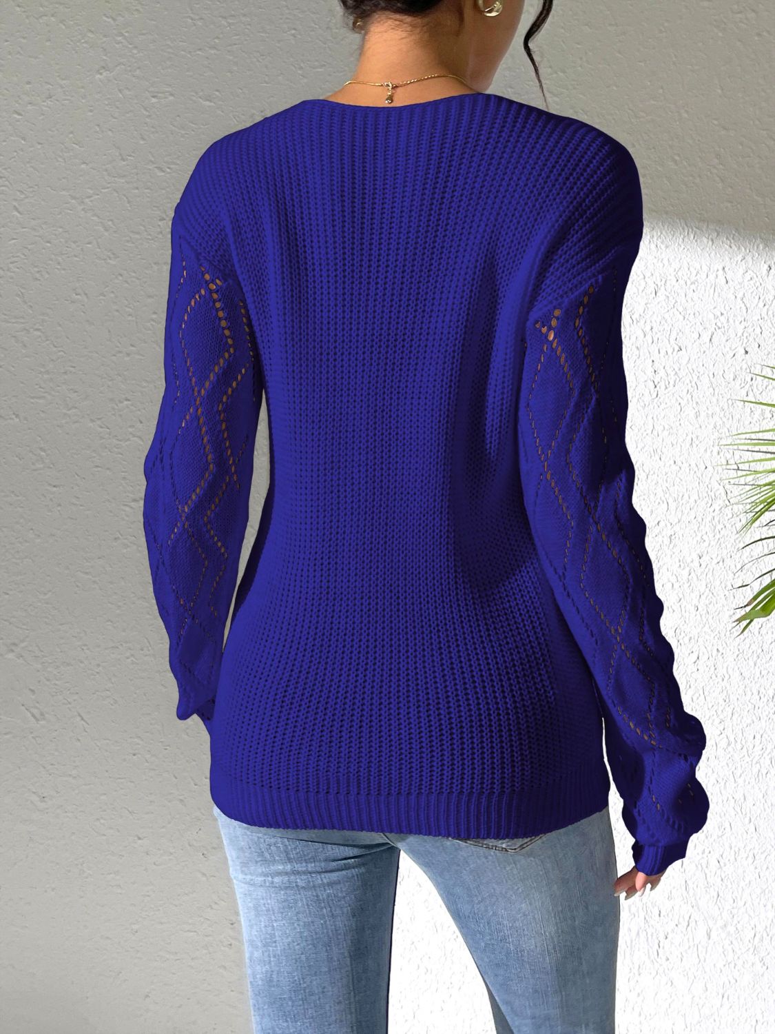 Lucrezia | Openwork sweater with a V-neck and long sleeves