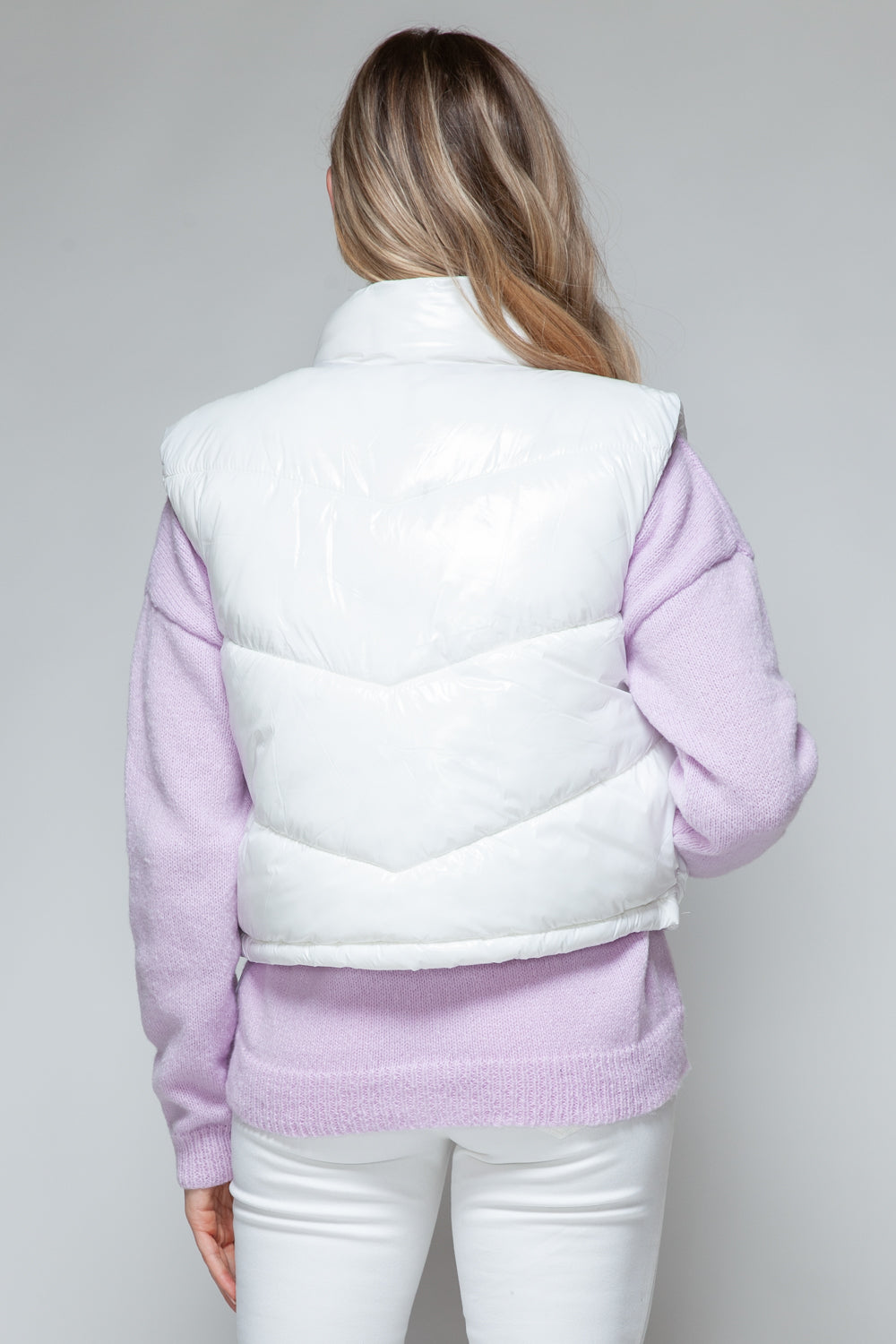 Milagros | Snobish shiny quilted vest with turtleneck and zip