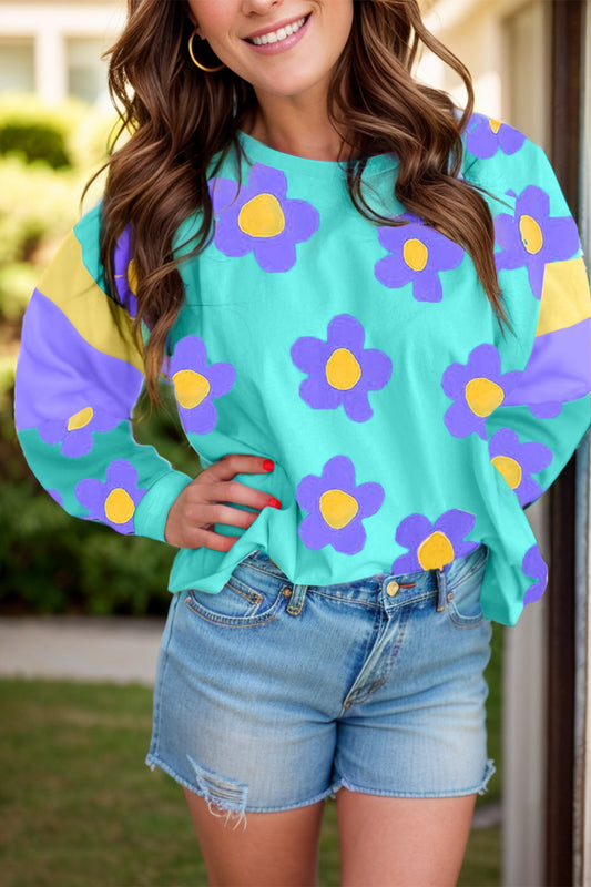 Jana | Long-sleeved blouse with a contrasting floral crew neck