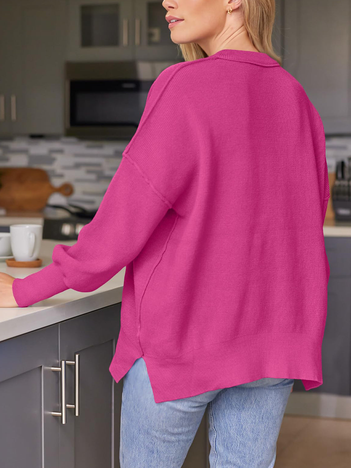 Evelyn | Slit sweater with a crew neck and dropped shoulders
