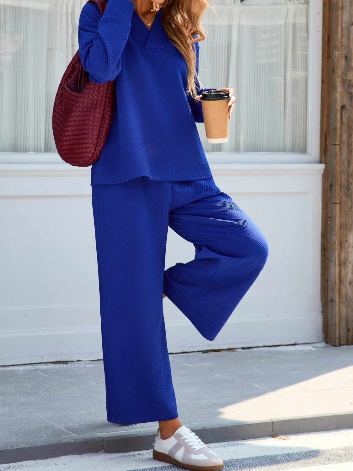 Eva | Set consisting of a long-sleeved top with a johnny collar and wide-leg trousers