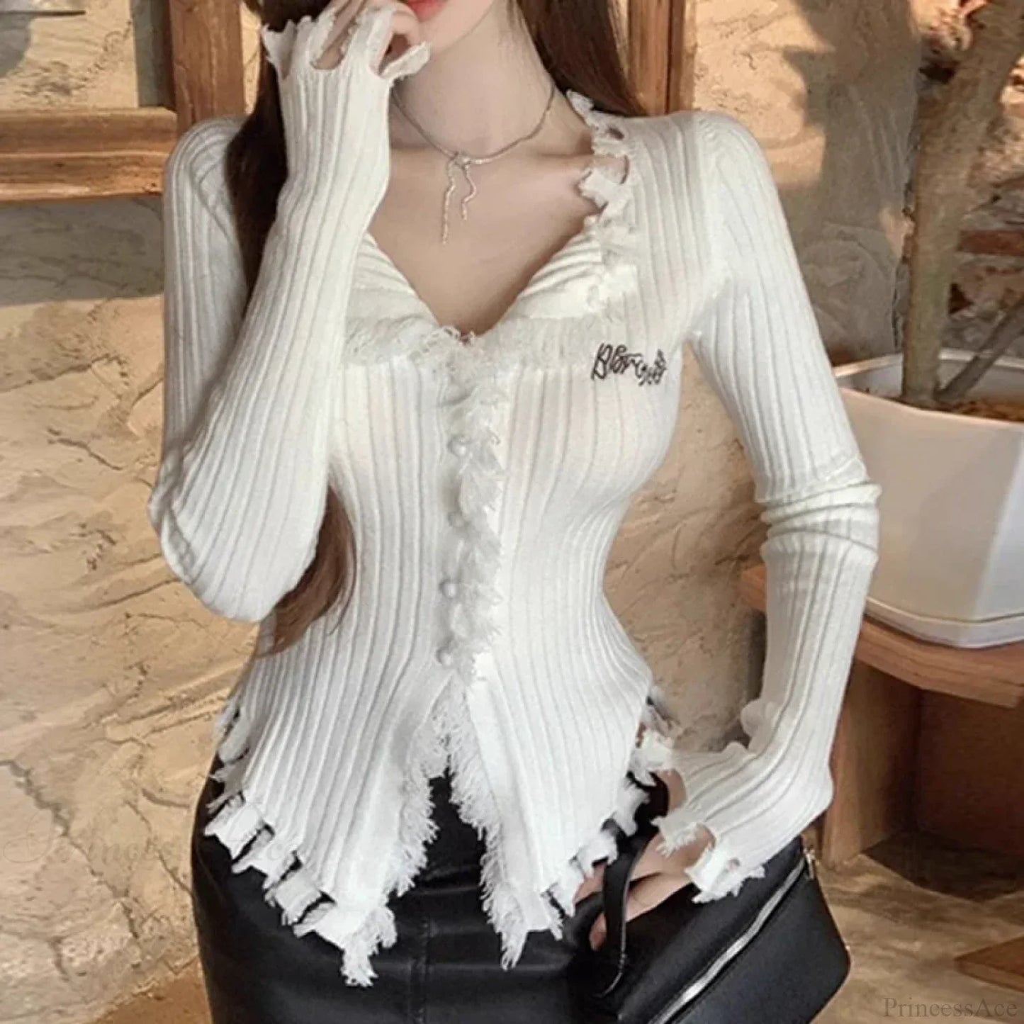 V-Neck Knit Sweater Pattern Tassel Irregular Hem Knit Top