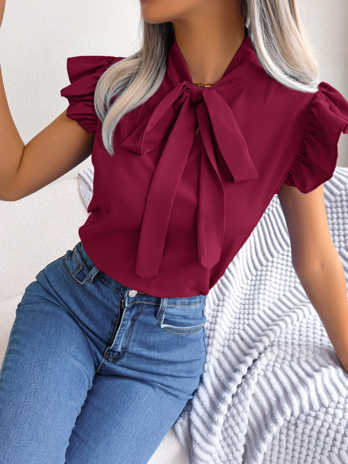 Evelin® | Sleeveless Blouse With A Tie Collar And Fringes On The Sleeves